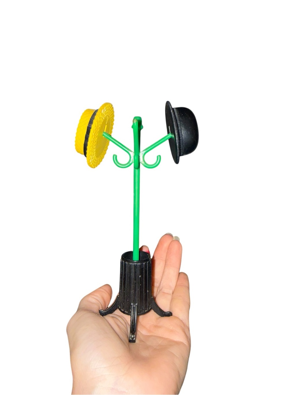 Vintage plastic Hat Stand with Yellow and Black Hat shakers